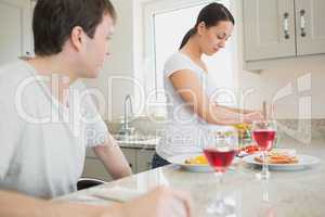 Wife preparing lunch for husband