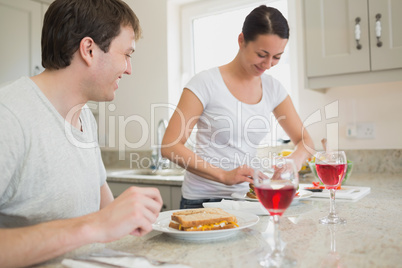 Friends having lunch in the kitchen