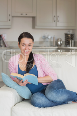 Young woman reading a book