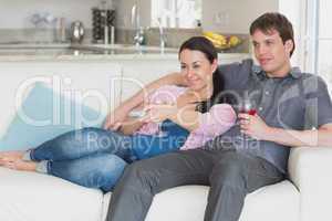 Young couple relaxing in the living room