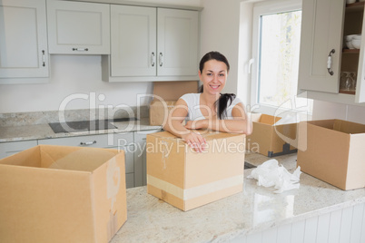 Smiling woman unpacking