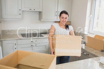 Young woman unpacking