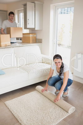 Two young people furnishing the house