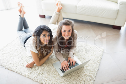 Two women using a computer