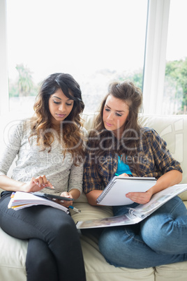 Two girls doing their homework