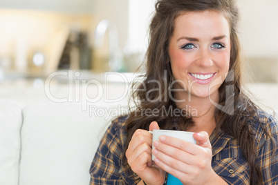 Woman having a cup of coffee