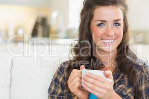 Woman having a cup of coffee