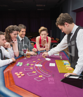 People playing poker in a casino
