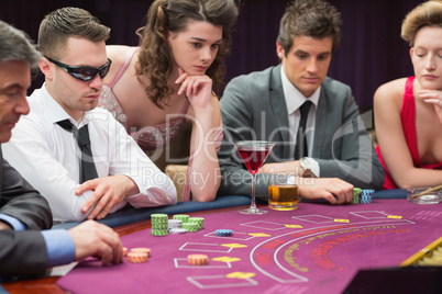 People around the poker table