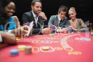 Happy people playing poker