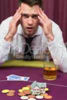 Man losing his house at poker game