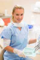 Professional dental staff with medical tools