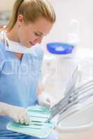 Dental nurse prepare medical tools
