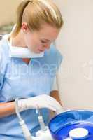 Dental nurse prepare professional equipment