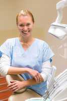 Smiling dental nurse in surgery office