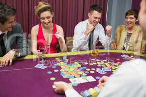 People winning in poker game