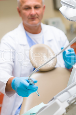Professional dentist prepare tools for treatment