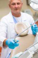 Professional dentist prepare tools for treatment