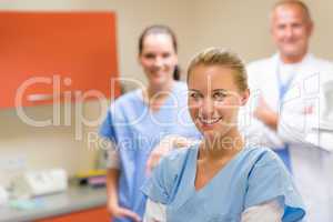 Smiling medical professional team at the surgery