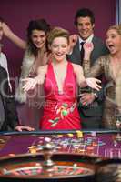 Woman winning at roulette