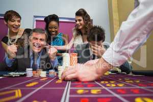 Man celebrating victory at roulette