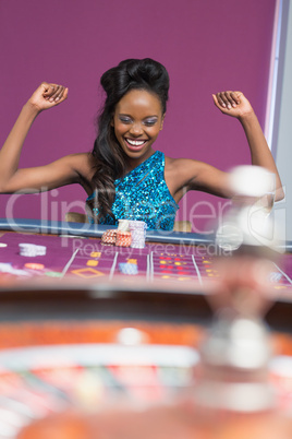 Woman winning at roulette table