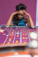 Woman losing at roulette