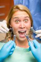 Scary dental tools crazy patient facial expression