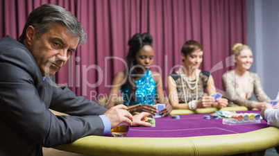 Man sitting at the table at the casino