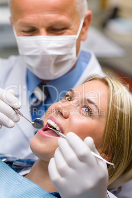 White teeth woman patient at the dentist