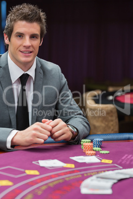 Man sitting at the table smiling