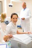 Dental assistant prepare patient personal document