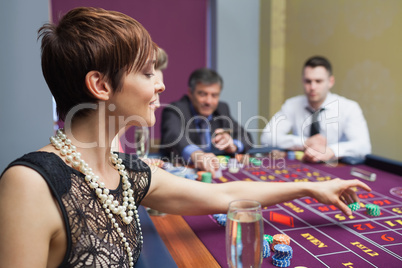 Woman placing a bet