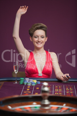 Woman celebrating at roulette