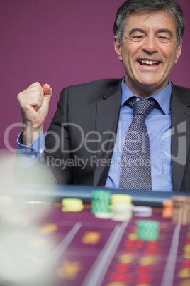 Winning man playing roulette