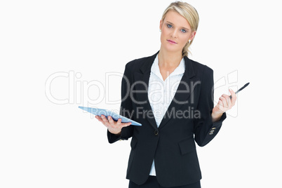 Woman holding tablet and pen