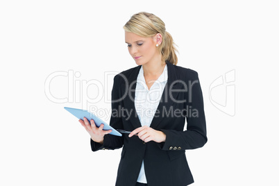 Woman planning and touching on her tablet