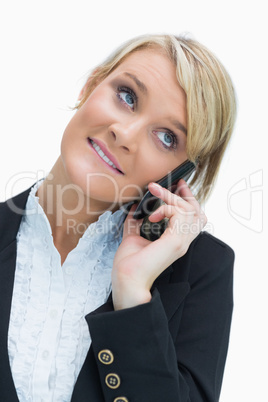 Blonde smiling while calling