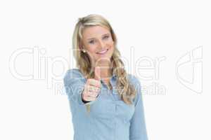 Woman giving thumbs up sign