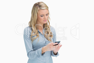 Woman texting with her smartphone