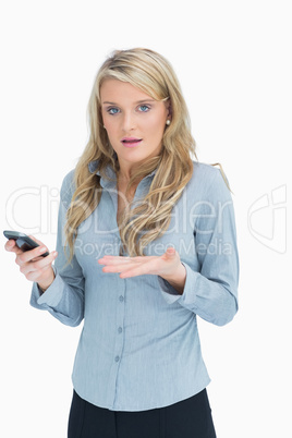 Woman wondering about smartphone