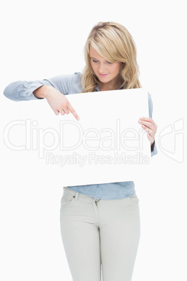 Woman pointing on the piece of paper