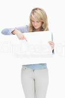 Woman pointing on the piece of paper