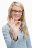 Woman giving ok sign