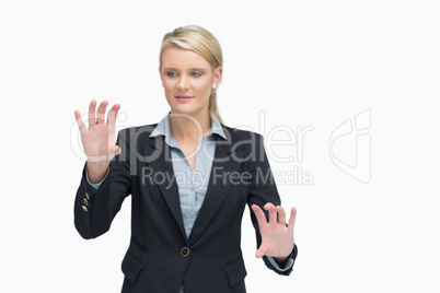 Businesswoman presenting with both hands