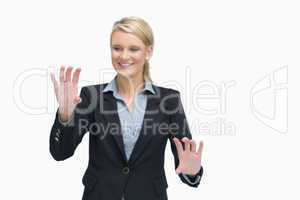 Smiling business woman presenting