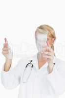 Doctor studying large blank pane