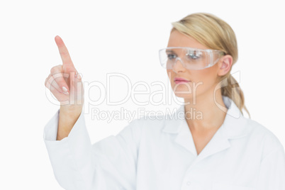 Woman concentrated pointing on something