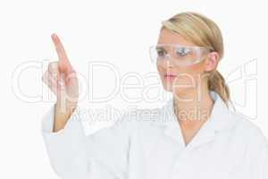 Woman concentrated pointing on something