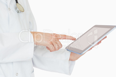 Doctor pointing on a tablet pc